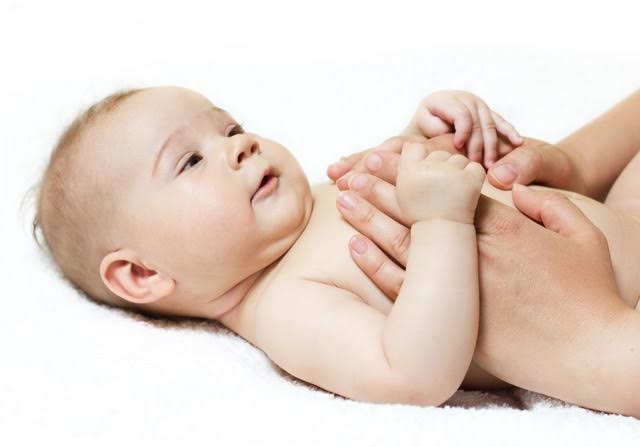 how infant massage can help babies heal, bond, and sleep well